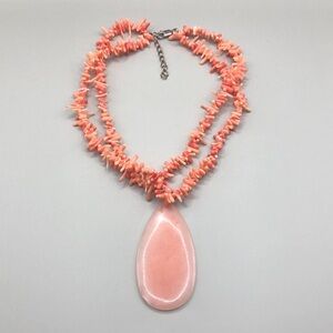 Vintage artisan layered angel coral skin pendant sterling silver clasp necklace.